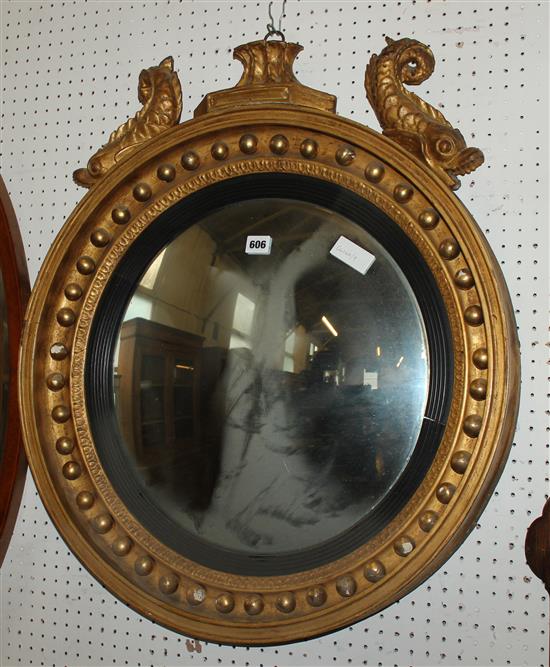 Antique gilt convex dolphin mirror